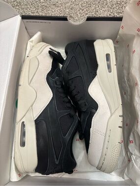 Jordan 4 RM Men's Black and White Low-Top Sneakers